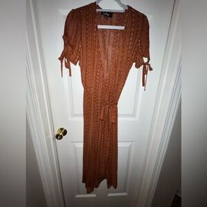 Maxi orange patterned wrap dress from Lulu’s